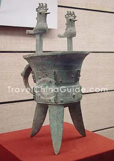 A Three-legged Wine Heating Vessel with A Mouth of Double-Phoenix-Pillar